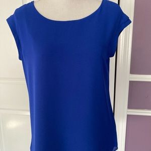 Womens Express Size XS blouse, blue/black reversible cap sleeves, v in back.
